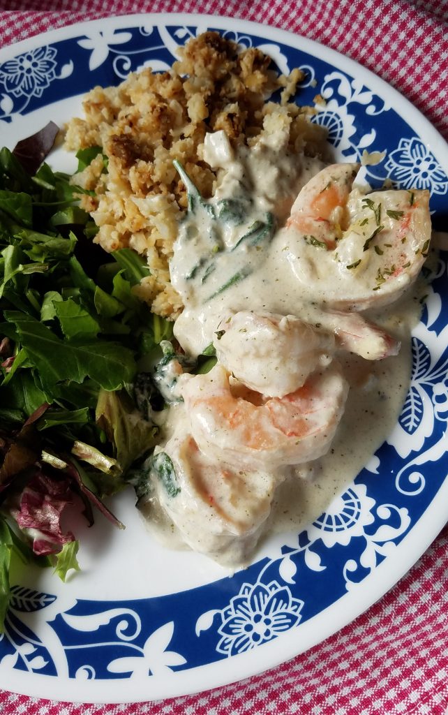 Easy Keto Creamy Shrimp Alfredo Recipe (with garlic) on a white plate.