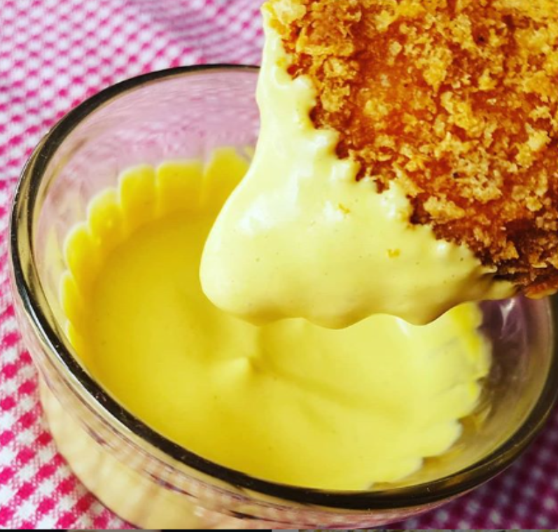 low carb honey mustard with a chicken strip for dipping