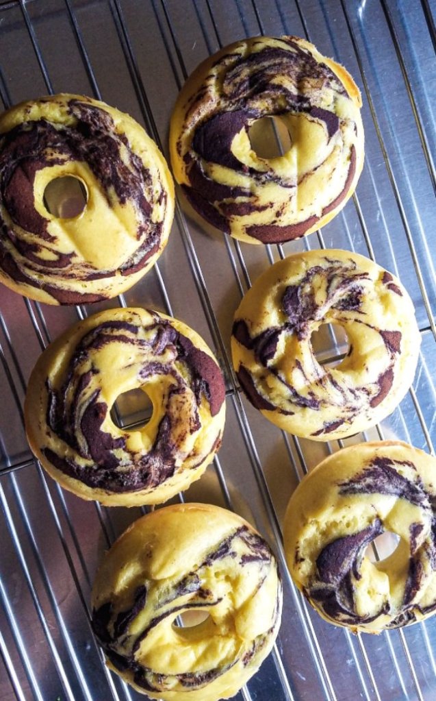 keto cinnamon swirl bagels on a cooling rack