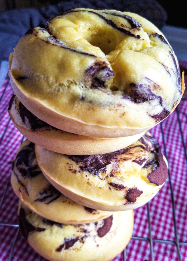 Keto cinnamon swirl bagels stacked up in a tower