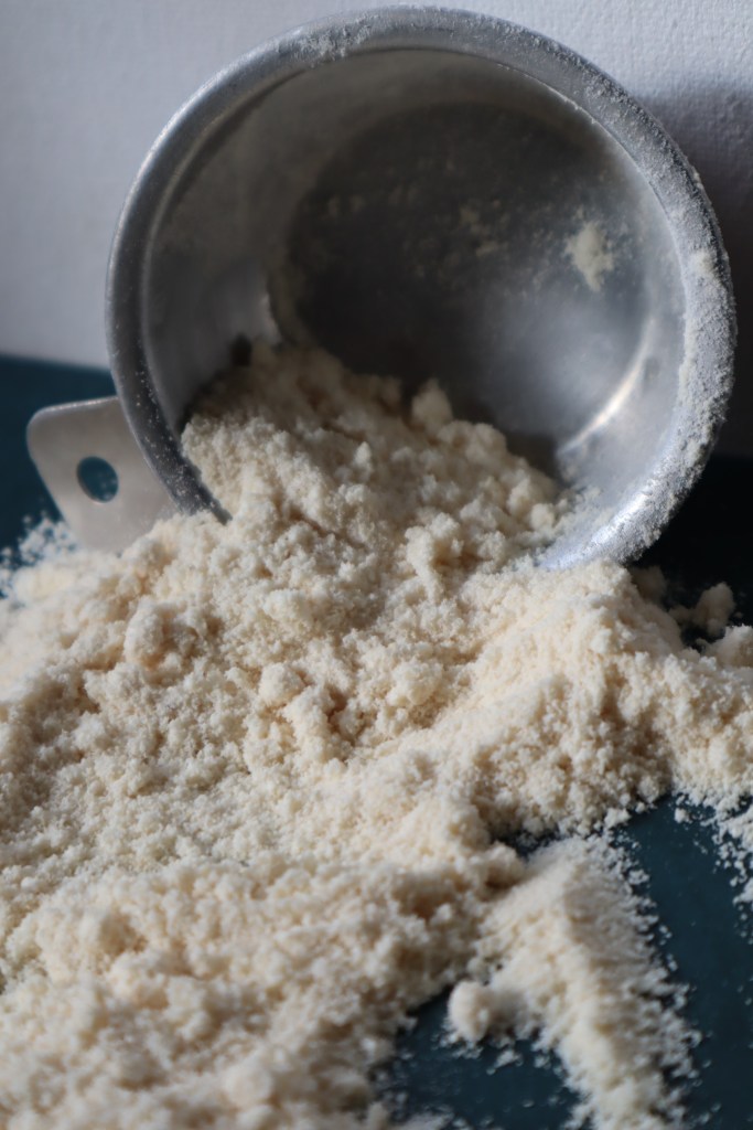 Coconut flour with metal measuring cup