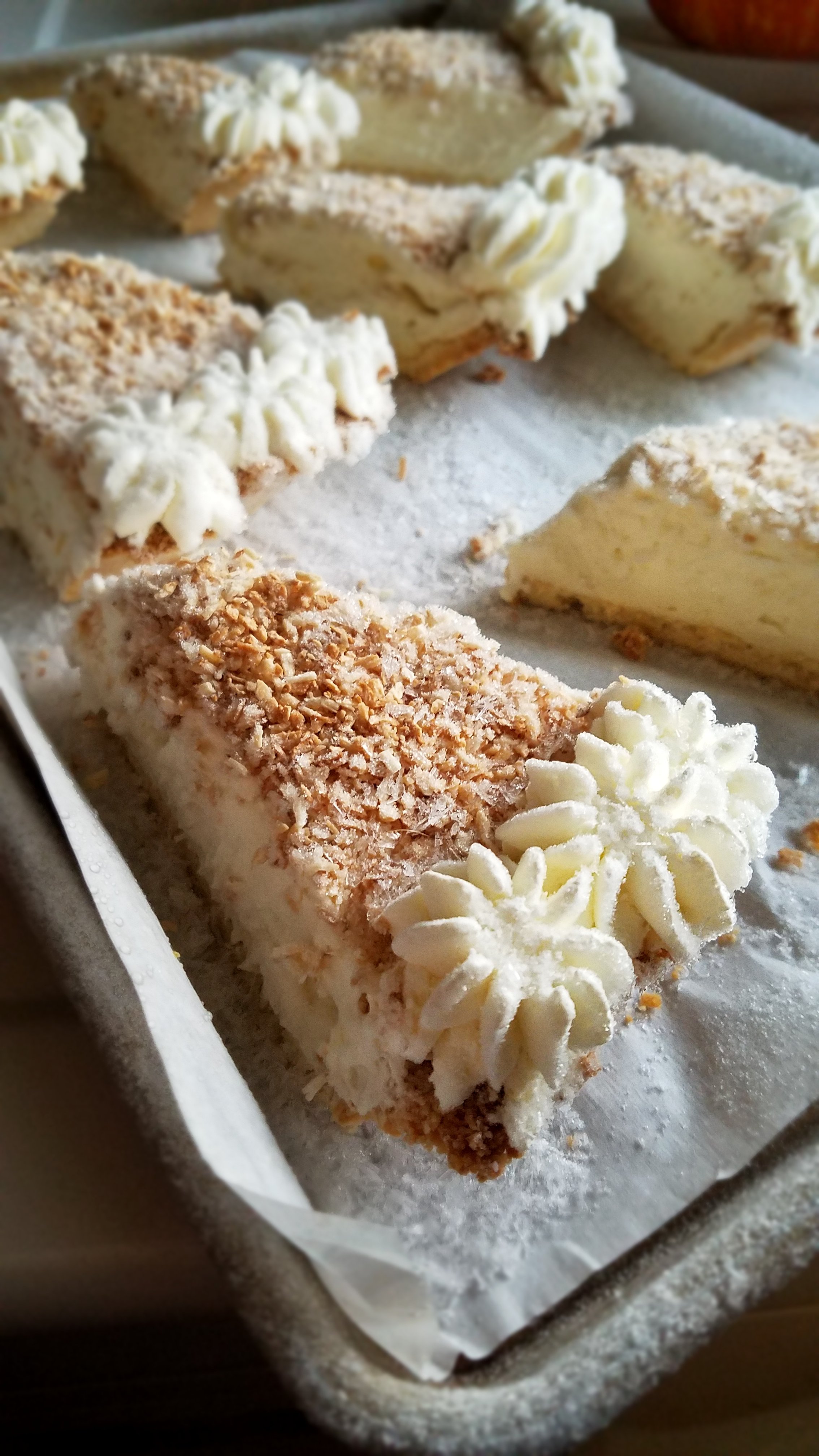 coconut cream pie frozen on a sheet pan