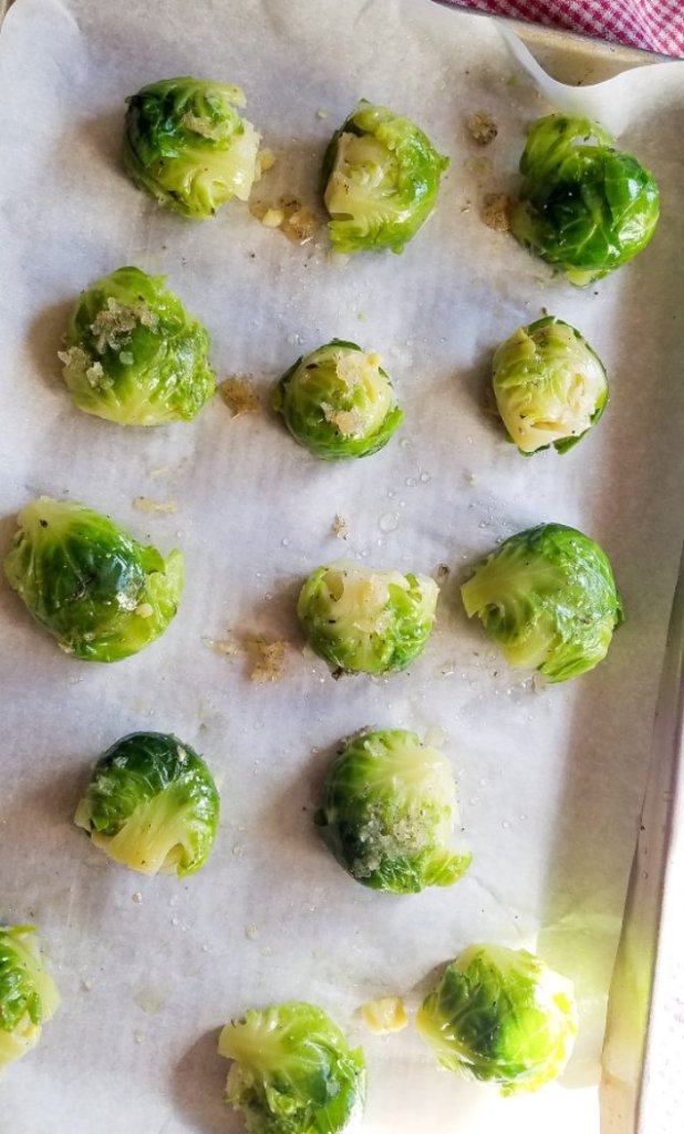 boiled brussels sprouts coated with garlic sauce