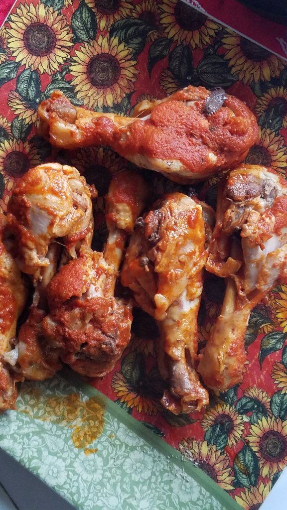 chicken after being cooked in enchilada sauce