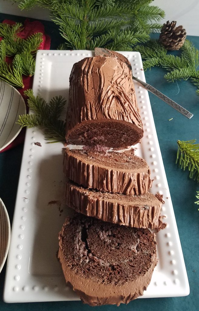 gluten free chocolate cherry yule log recipe cut on a platter