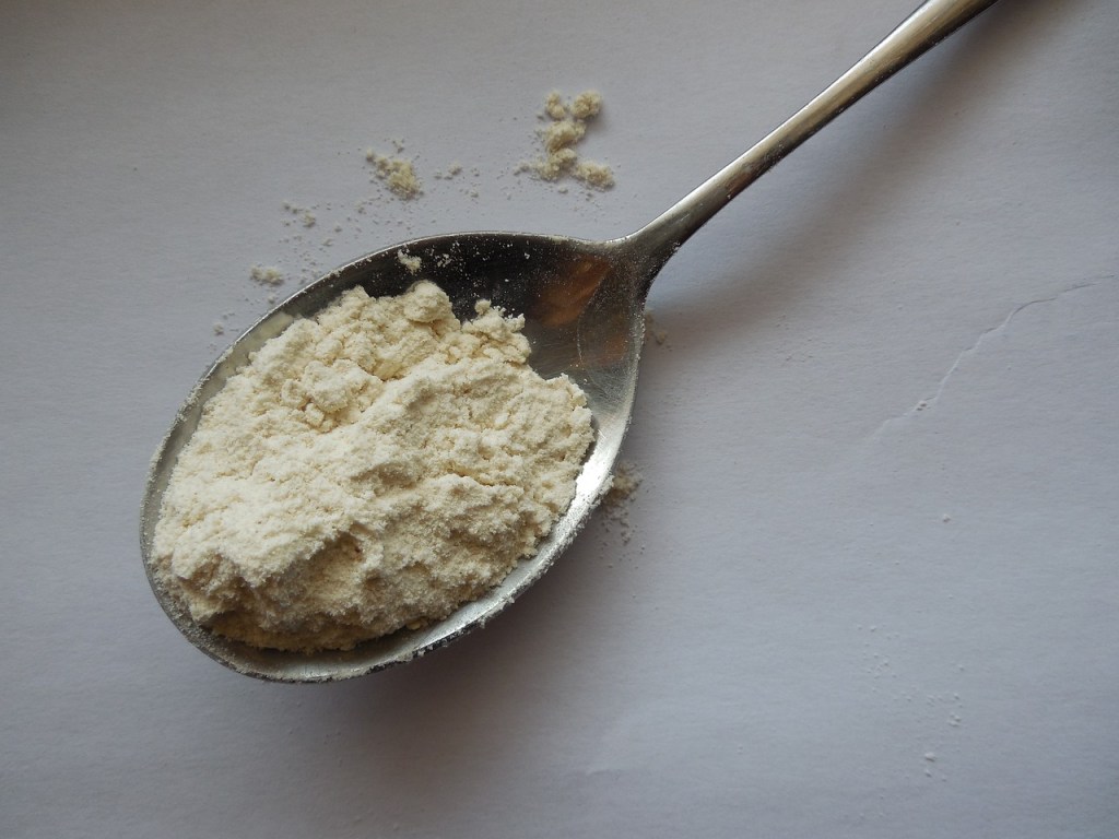 coconut flour in a spoon