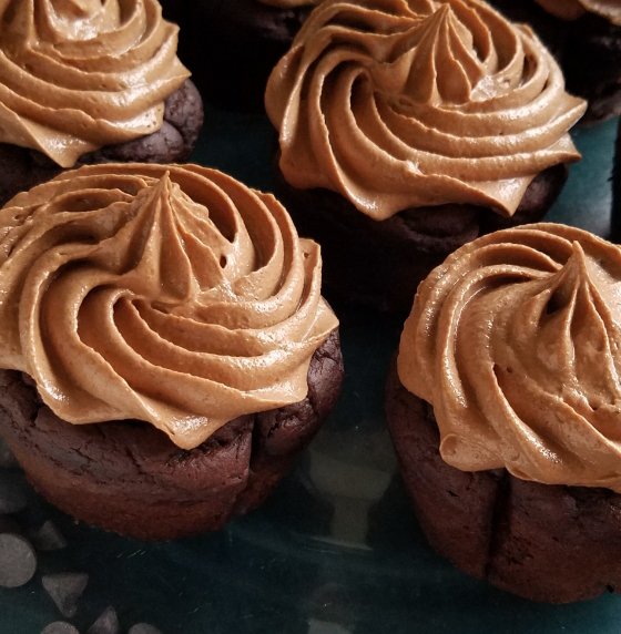chocolate buttercream frosting on a mocha cupcake