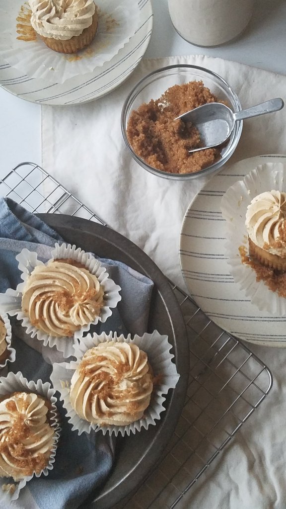 keto butterscotch caramel cupcakes in a tin.