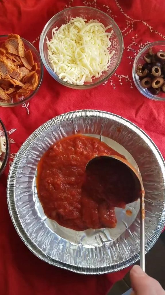 spreading sauce for easy low carb keto crustless pizza casserole recipe