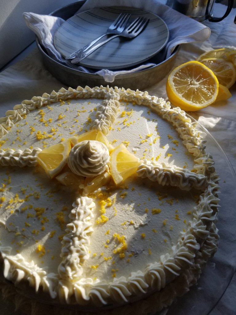 picture of the best sugar free lemon cake with a piece on a plate nearby