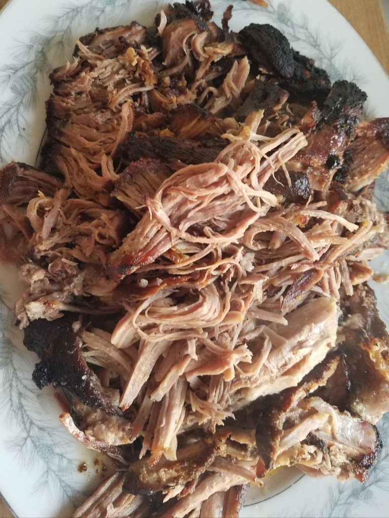 easy pork shoulder roast shredded from the oven.