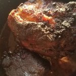 pork shoulder with a seared crust after coming out of the oven