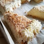 coconut cream pie frozen on a sheet pan