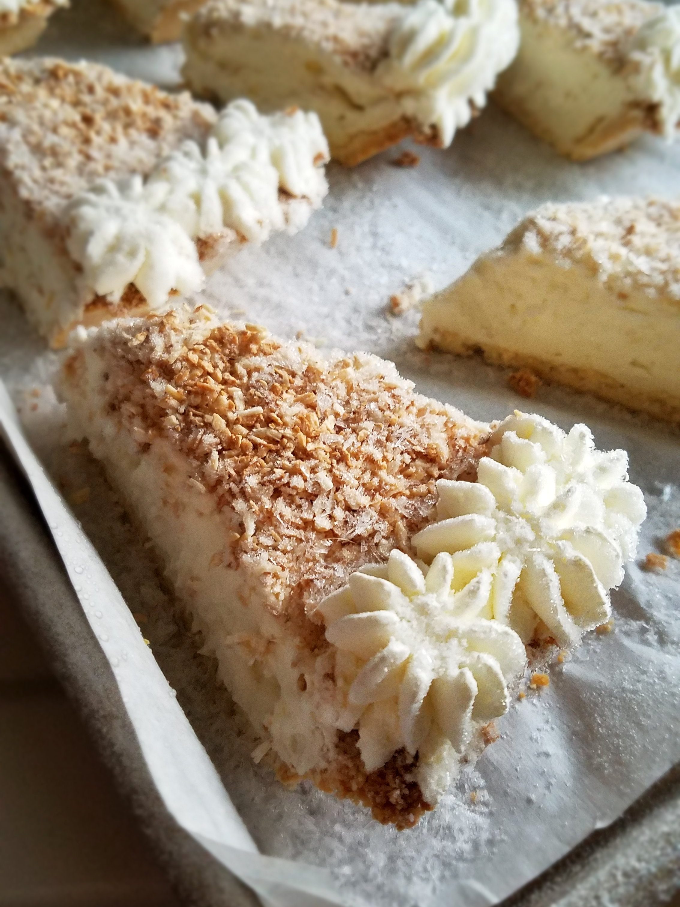 coconut cream pie frozen on a sheet pan