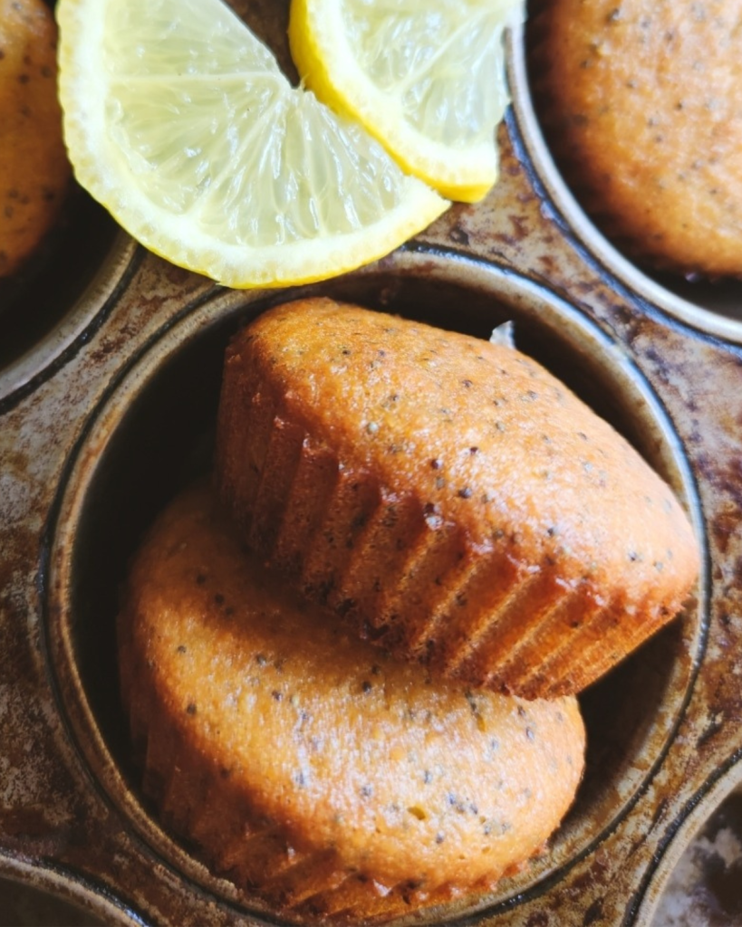 Gluten free keto lemon poppyseed muffins in an muffin tin