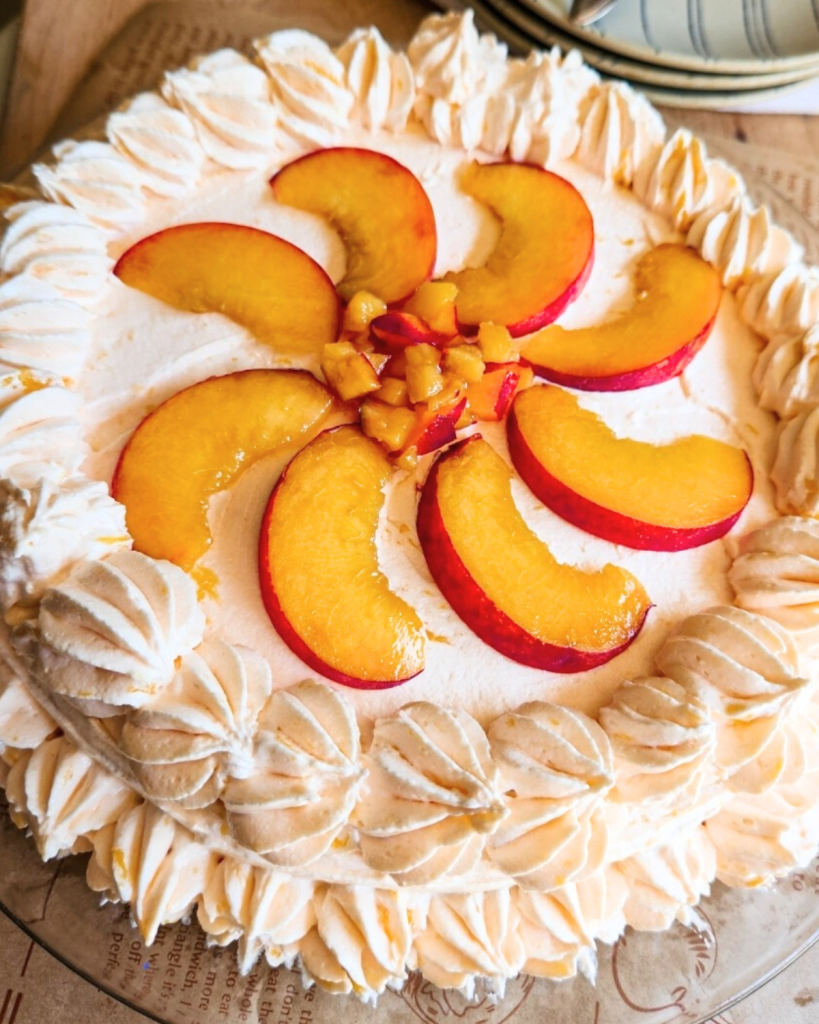 low carb gluten free peach cake with decorative sliced peaches on top