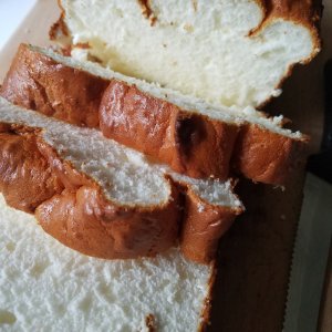 gluten free keto flourless hawaiian bread cut on a cutting board