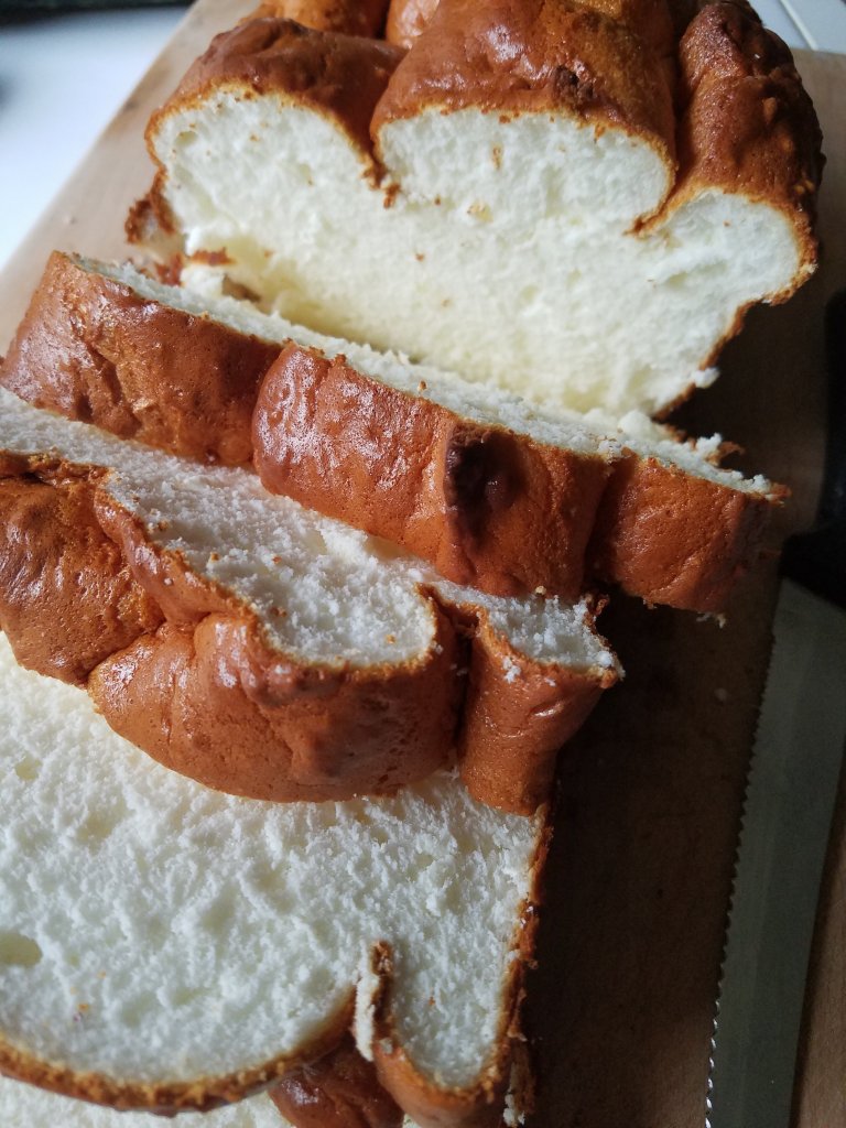 gluten free keto flourless hawaiian bread cut on a cutting board