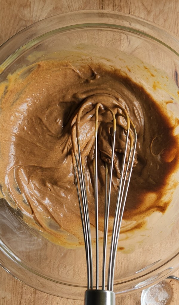 Wet ingredients being whisked for Gluten-free dairy free cinnamon bread