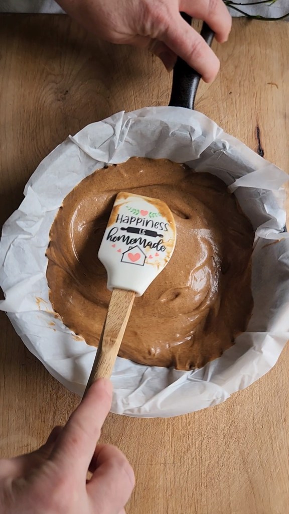 Gluten-free dairy free cinnamon bread batter being spread into skillet