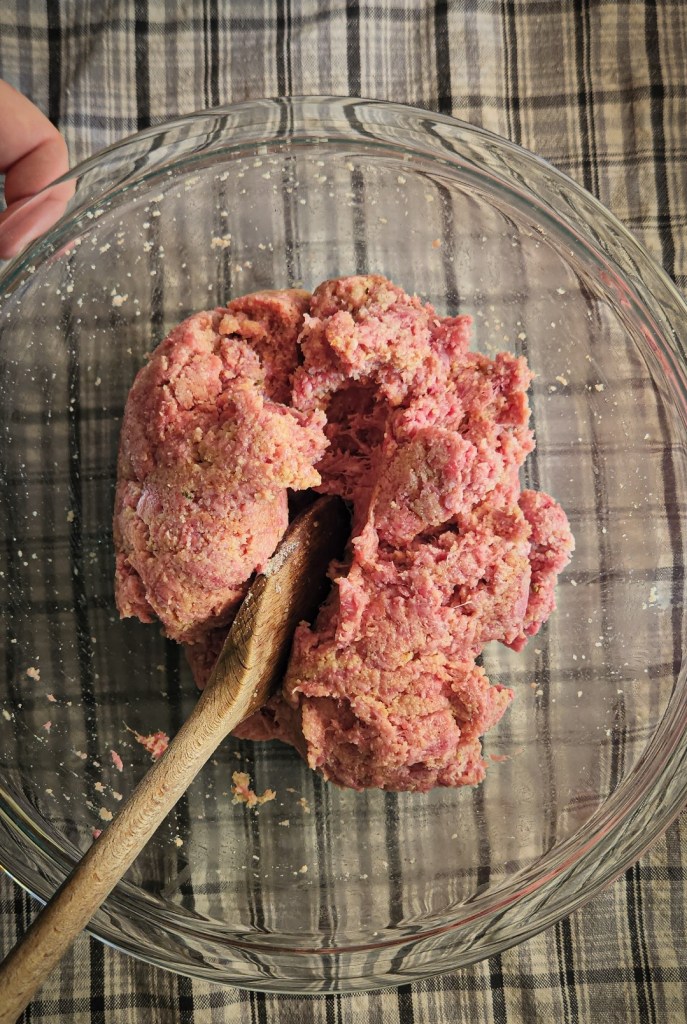 Gluten-free Salisbury steak raw meat in a bowl