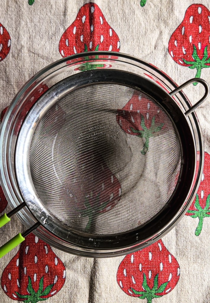 strainer over bowl.
