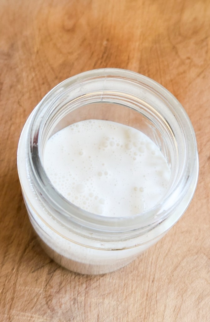 heavy cream in a jar.
