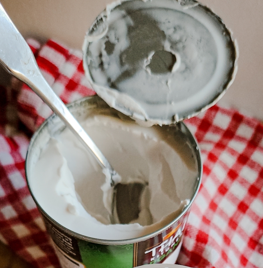 can of refrigerated coconut milk with solid top.