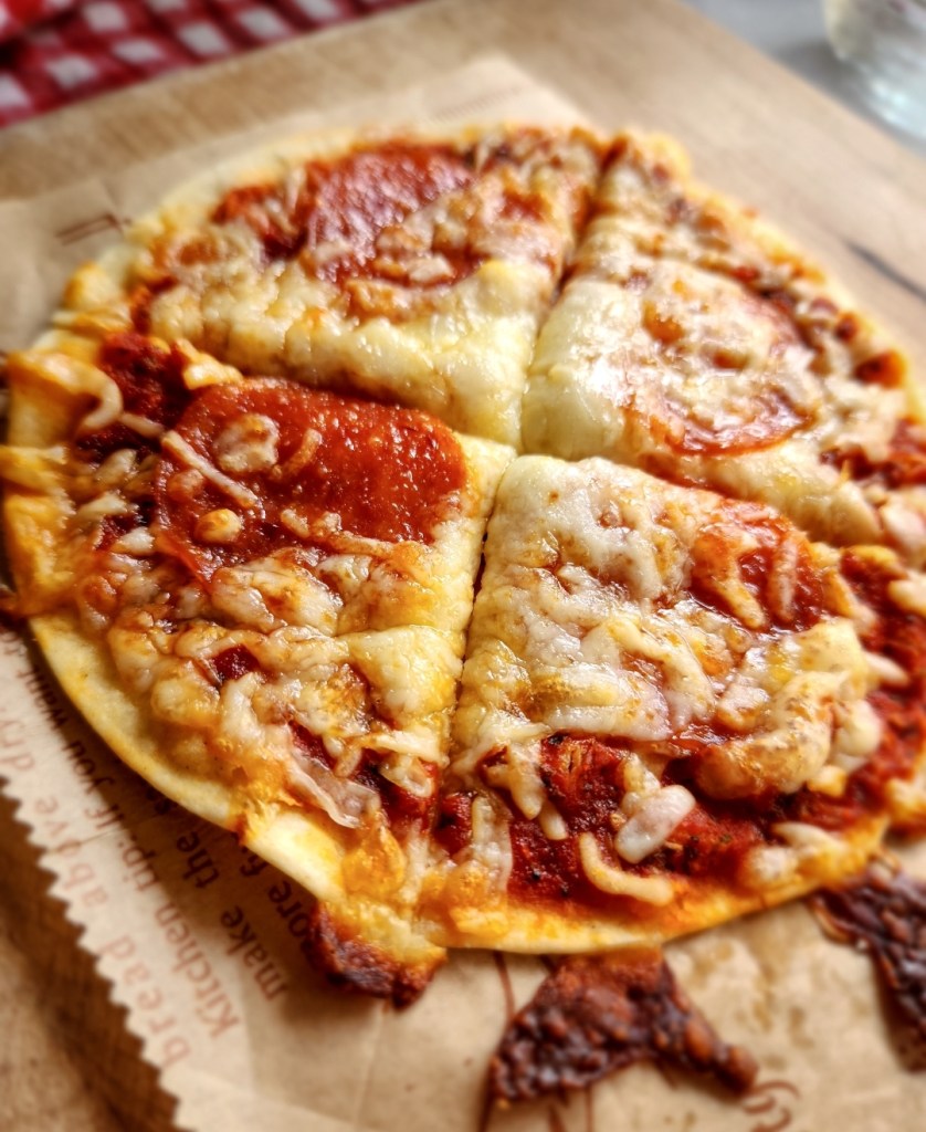 easy gluten free low carb tortilla pizza recipe cut.
