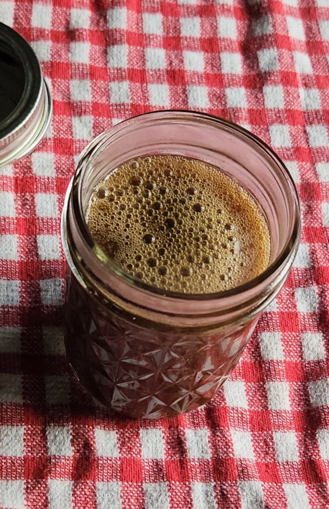 Easy keto maple syrup substitute recipe in a jar without a lid.