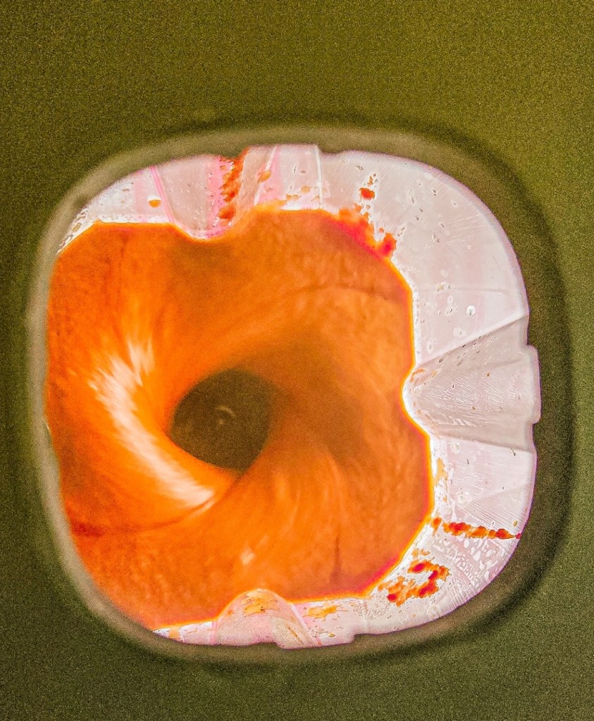 Easy low carb recipe for gluten-free enchilada sauce being Blended in the blender