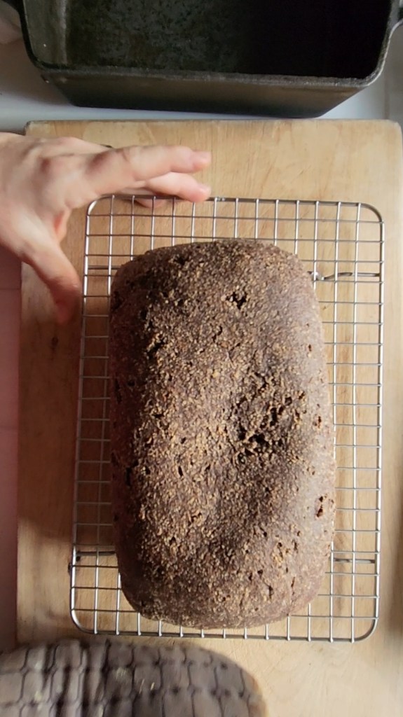 the best gluten free low carb bread baked and cooling on a wire rack.