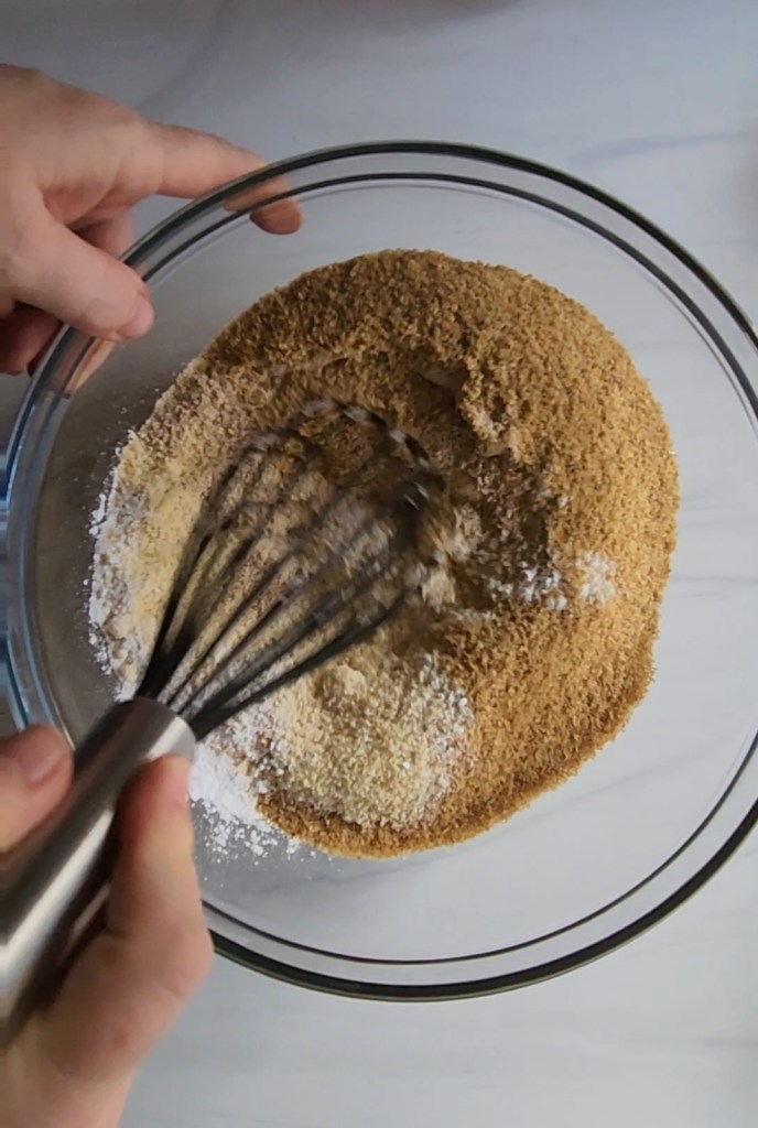whisking up the dry ingredients for the best gluten free low carb bread recipe.