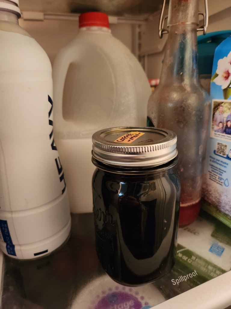 Brewed coffee in a jar in the fridge.