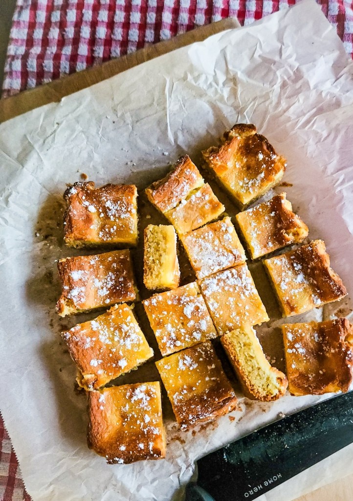 Batch of Keto gooey butter cake cut.