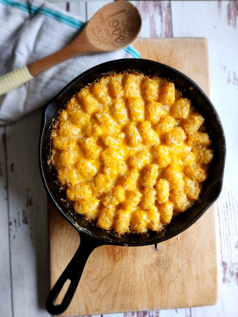 Low carb tater tot casserole in a cast iron skillet
