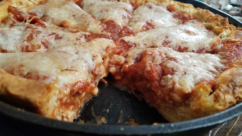 closeup of gluten free deep dish pizza.