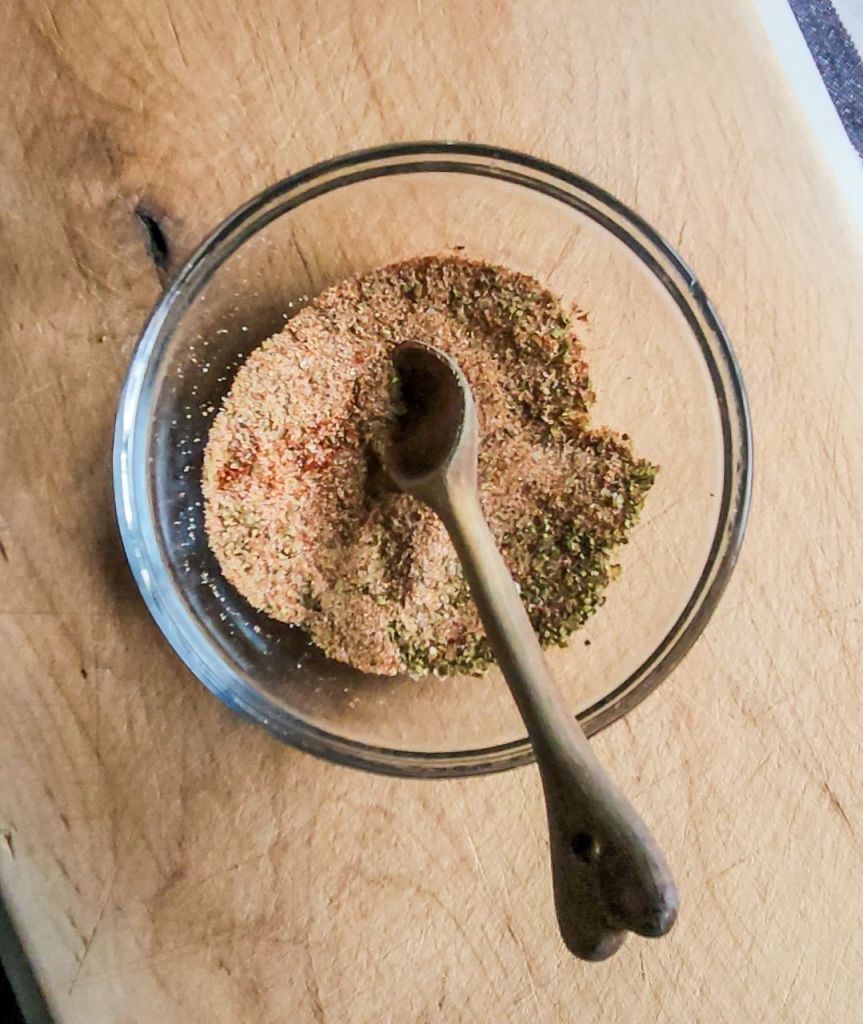 Mix of spices for dry rub on pork loin.