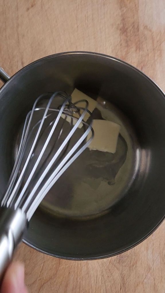 Making gluten free low carb cream soup in a saucepan.