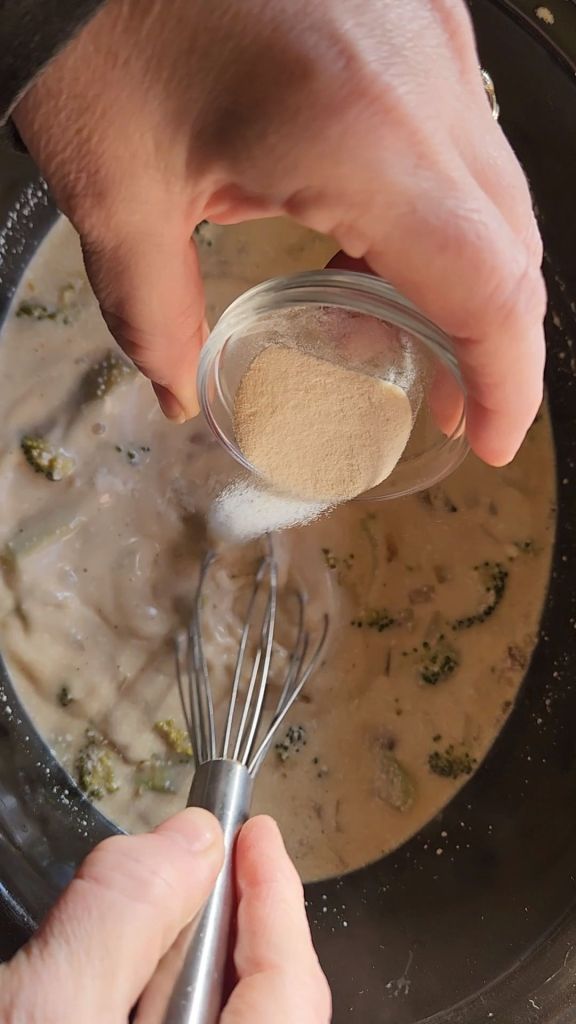 adding in xanthan gum to the ham and broccoli soup.