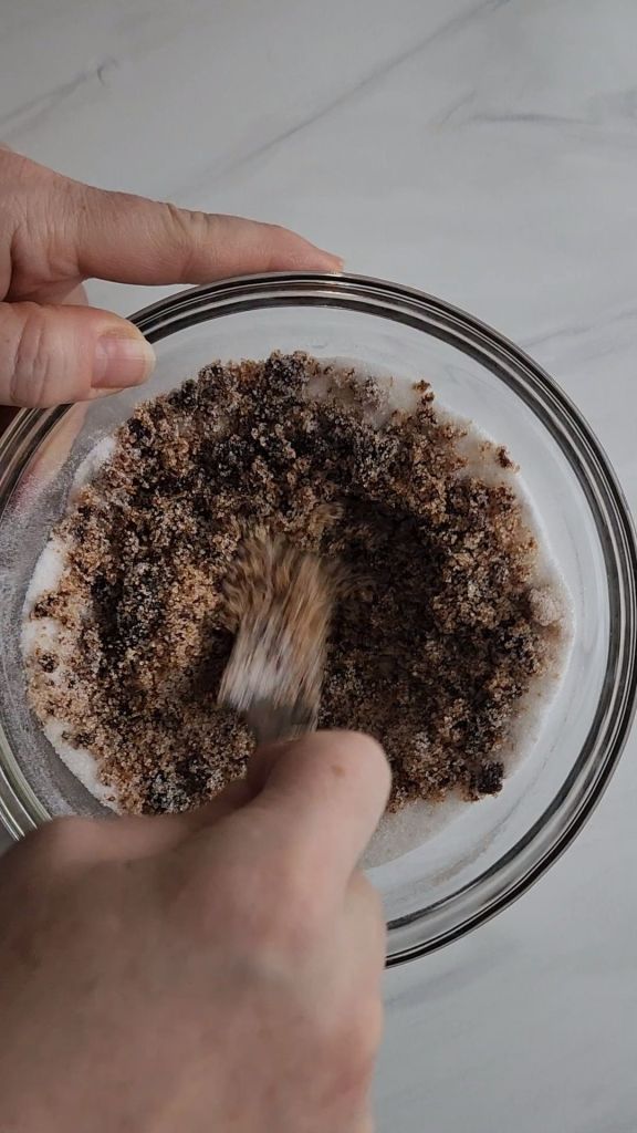 Working the Molasses into the granulated sugar-free sweetener.
