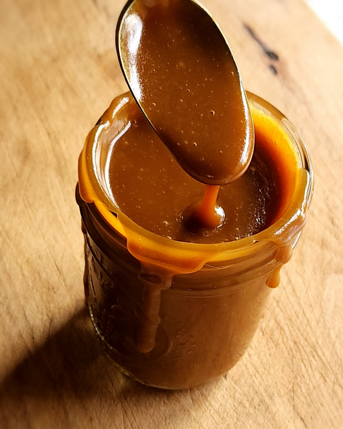 easy homemade low carb butterscotch syrup recipe in a jar.