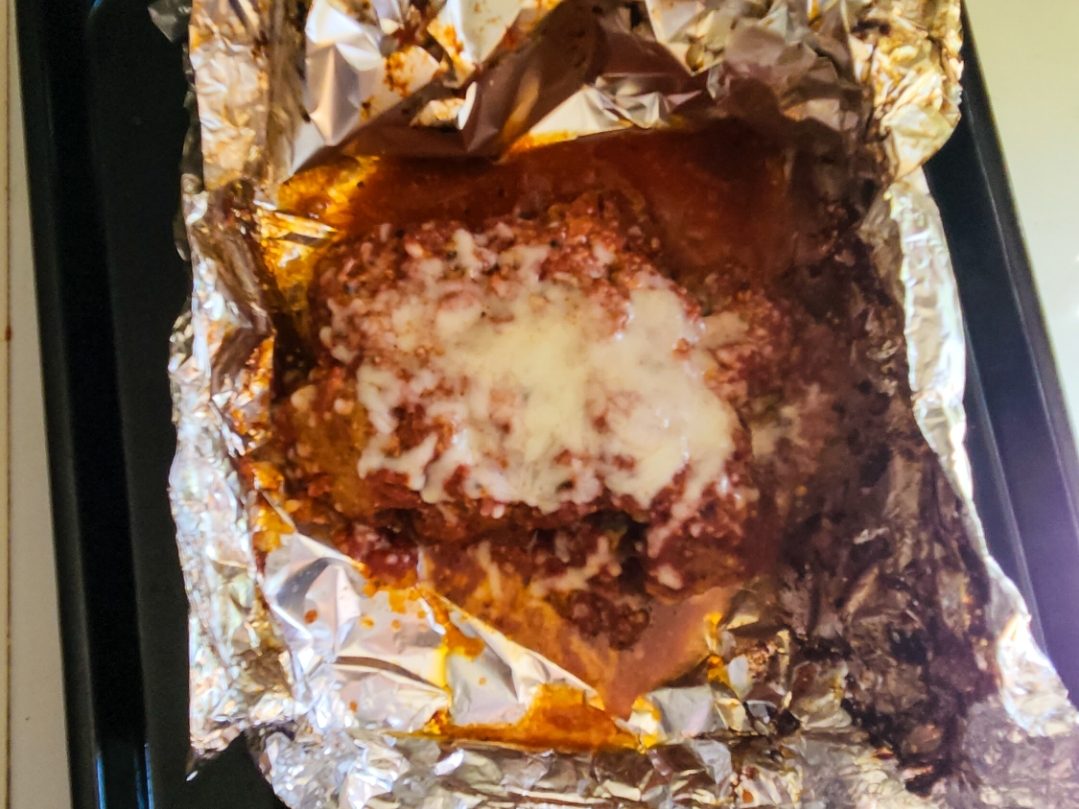 meatballs after being reheated in an airfryer in a foil packet