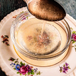 Keto friendly honey substitute being poured from a spoon.