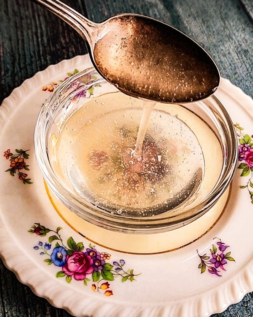 Keto friendly honey substitute being poured from a spoon.