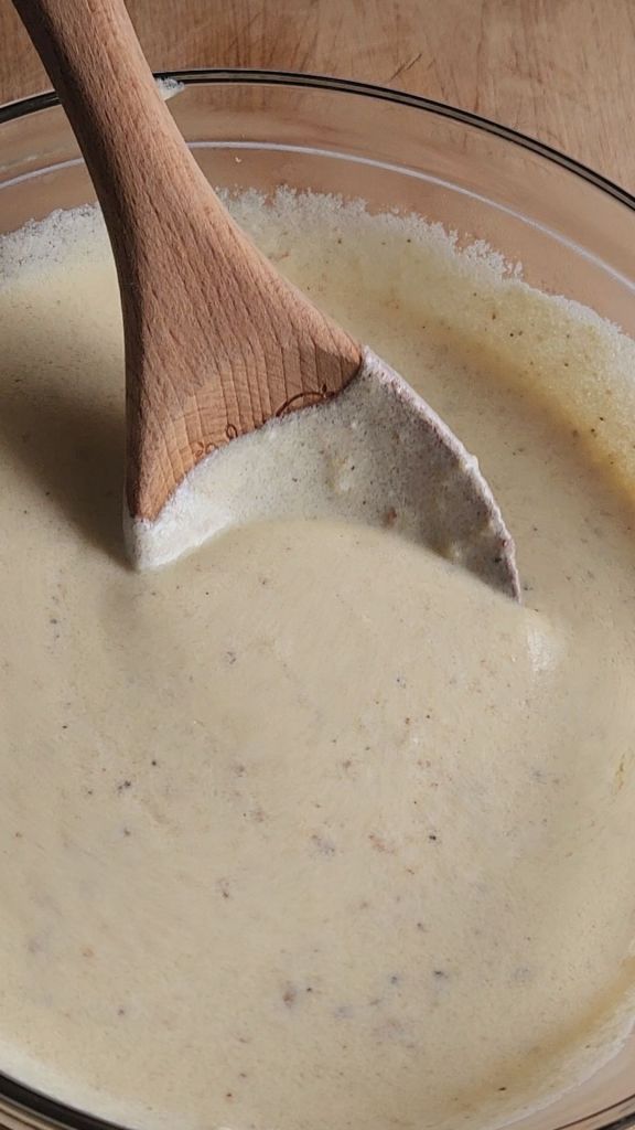 Easy gluten free crockpot ragu Alfredo sauce recipe in a bowl.