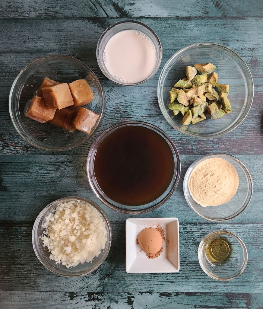 Ingredients to make keto chocolate almond mocha protein smoothie.
