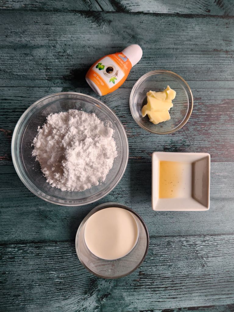 Ingredients needed to make grandma's gluten-free cinnamon coffee cake recipe drizzle topping.
