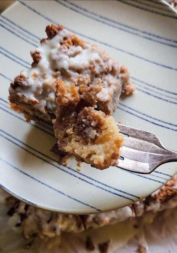 Eating grandma's gluten-free cinnamon coffee cake with a fork.