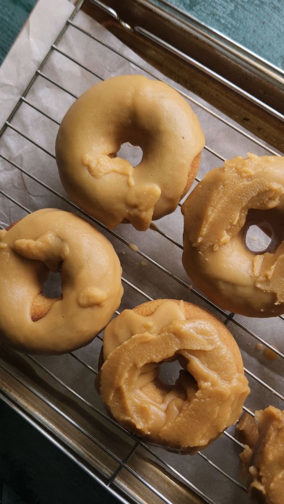 Glazed gluten-free maple donuts.